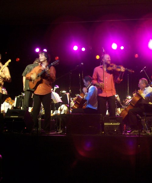 Sultans of String perform with the Windsor Symphony Orchestra by Sultans Of String