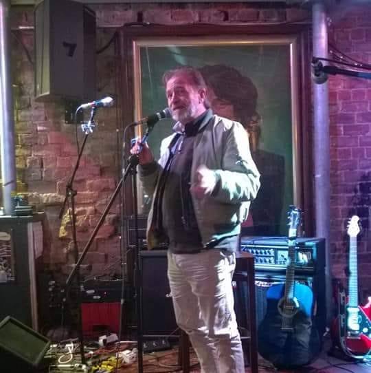 Reciting poetry at The Clutha bar in Glasgow, Scotland by David Nicoll And Friends